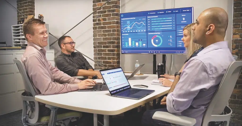 What is a Business Dashboard? Here's What You Should Know. 1 SPARK team creating and reviewing a business dashboard.