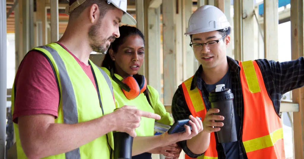 How to Plan for Digitization in a Construction Business 1 Contruction workers planning for digitization.